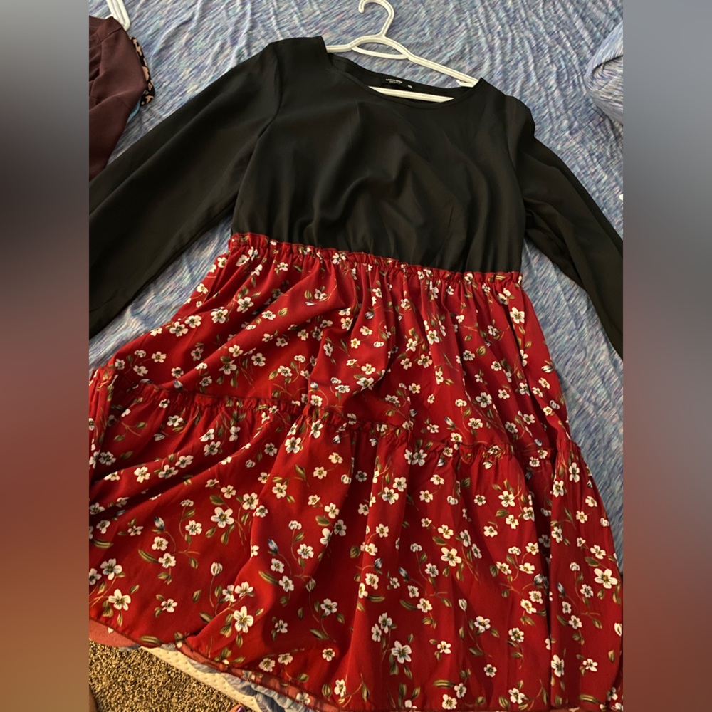 1Xl size dress.Black on the top and red with little flower designs on the bottom
